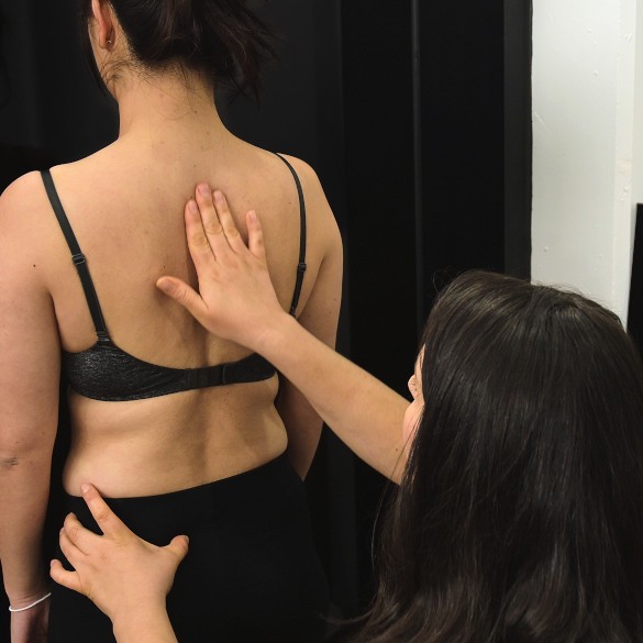Moreland Osteopathy treating a woman's scoliosis.